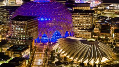 Aerial view at night of Al Wasl Dome and the UAE Pavilion