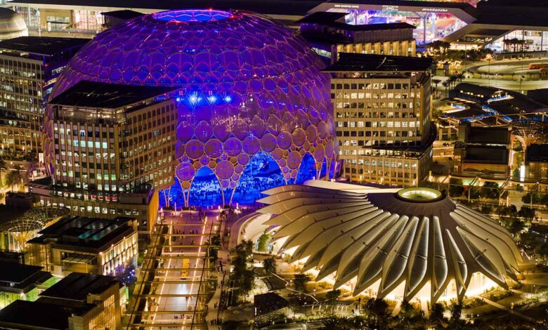 Aerial view at night of Al Wasl Dome and the UAE Pavilion